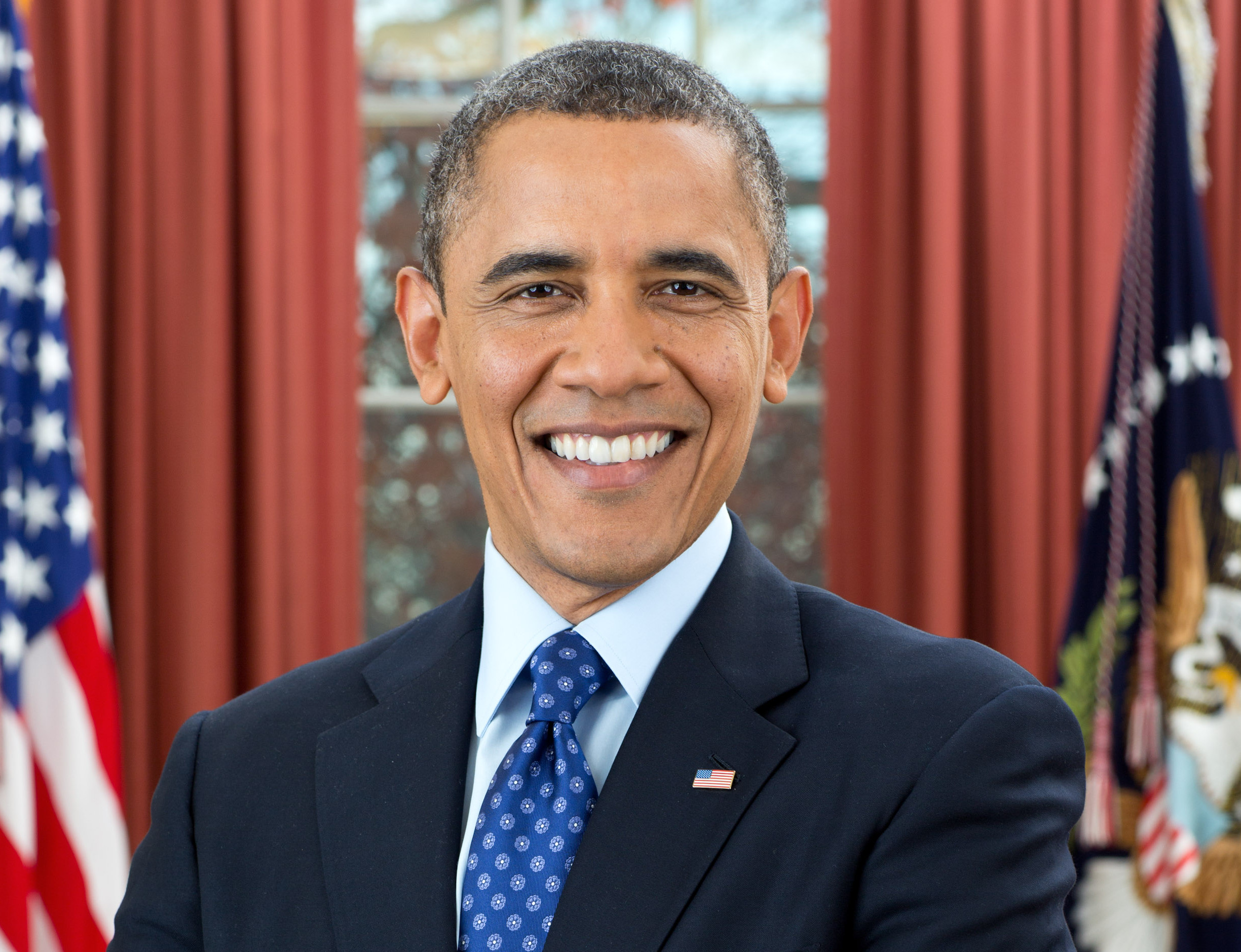 President Barack Obama is photographed during a presidential portrait sitting for an official photo in the Oval Office, Dec. 6, 2012. (Official White House Photo by Pete Souza)