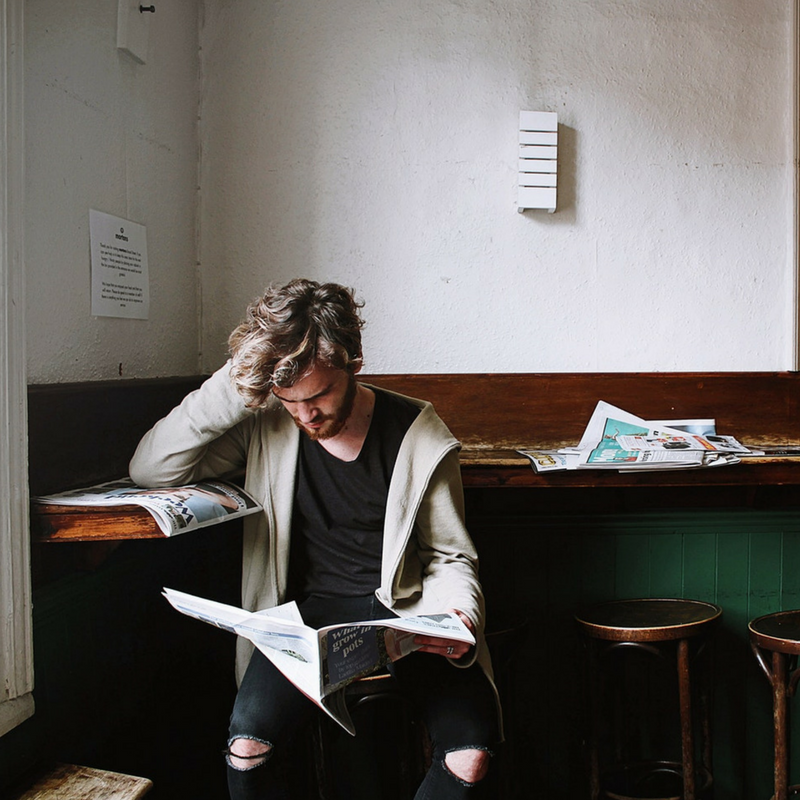 Man Reading Newspaper